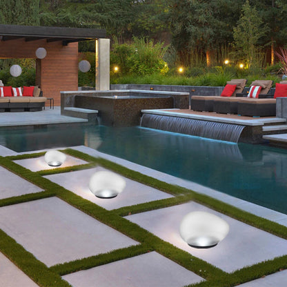 EcoPebble – Solar-Powered Pebble Lights for Garden Ambiance